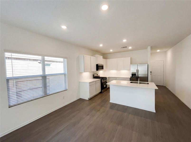 Furnished interior view inside a new home in The Colony, Bastrop (Image 8).