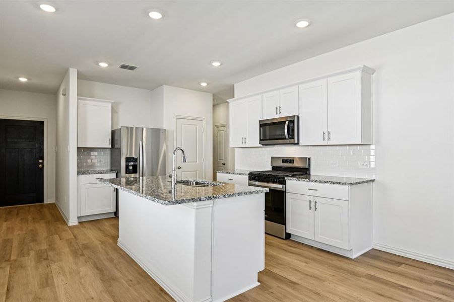 Furnished interior view inside a new home in Lakehaven - Spring Series, Farmersville (Image 8).