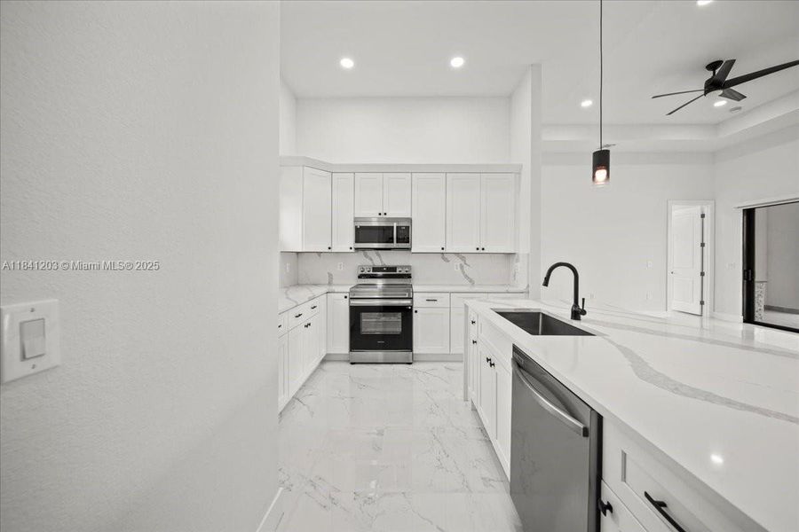 Furnished interior view inside a new home in , Cape Coral (Image 11). Furnished interior view inside a new home in , Cape Coral (Image 11).