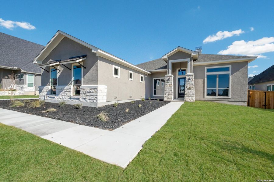 Front exterior of a new home in Harvest Hills, Marion, TX, highlighting curb appeal (Image 18). Front exterior of a new home in Harvest Hills, Marion, TX, highlighting curb appeal (Image 18).