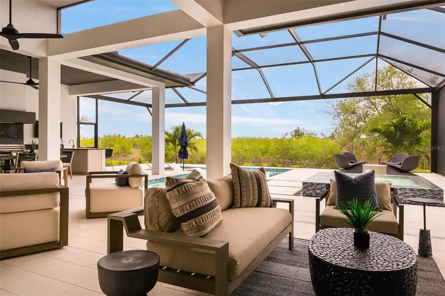 Exterior details and patio area of a home in , Sarasota (Image 16).