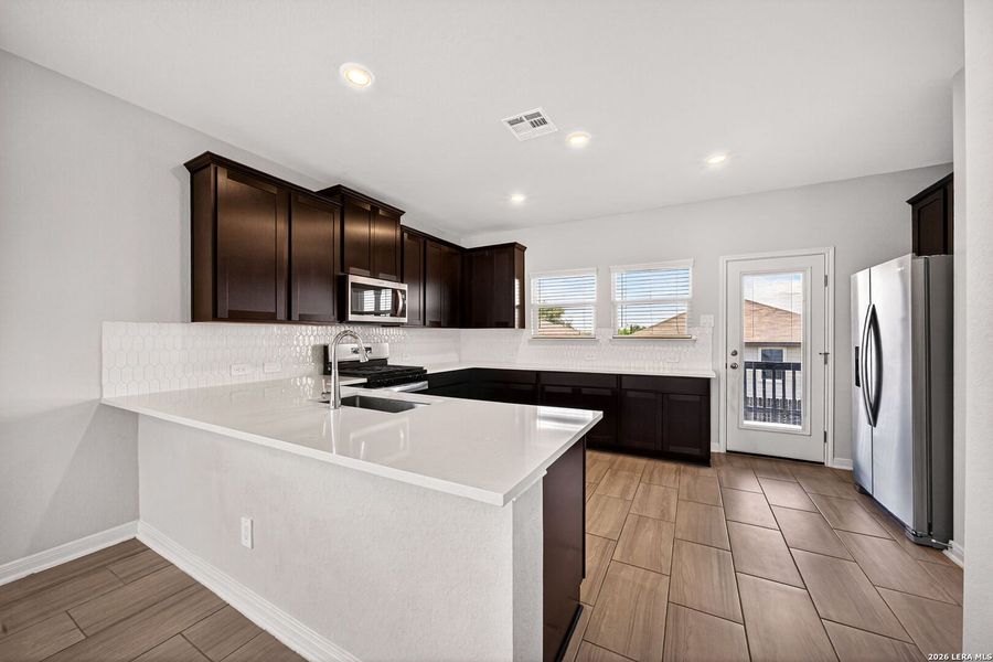 Furnished interior view inside a new home in Thomas Pond, San Antonio (Image 9).