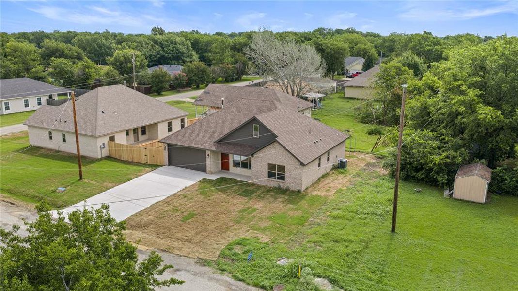 Front exterior of a new home in , Tom Bean, TX, highlighting curb appeal (Image 19).