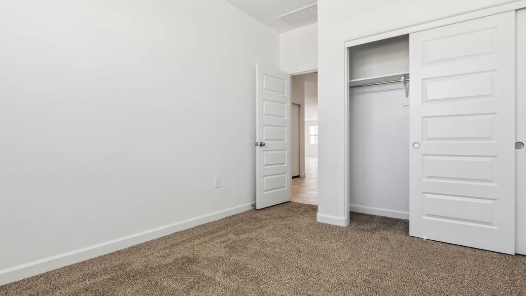 Spacious, unfurnished interior of a new home in Heartland Ranch, Coolidge (Image 21).