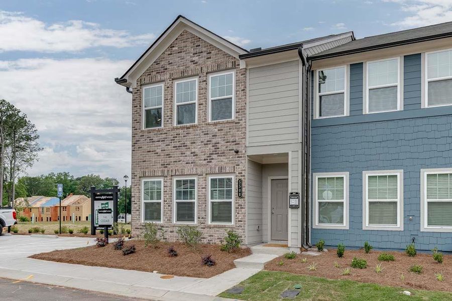 Front exterior of a new home in Laurelwood, Douglasville, GA, highlighting curb appeal (Image 21).