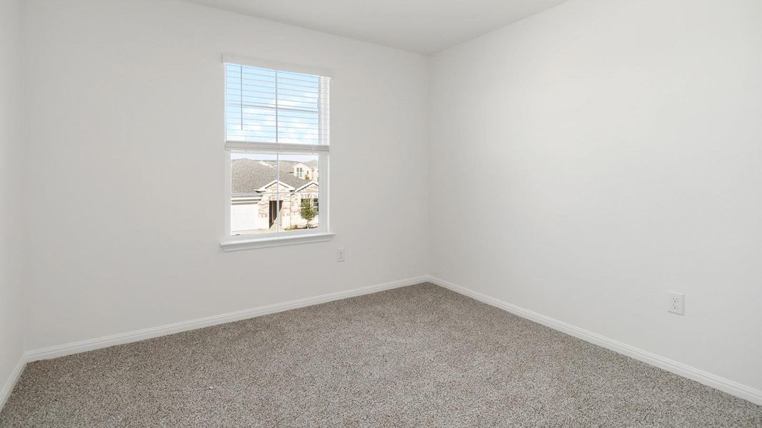 Spacious, unfurnished interior of a new home in Bar W Ranch, Leander (Image 13).