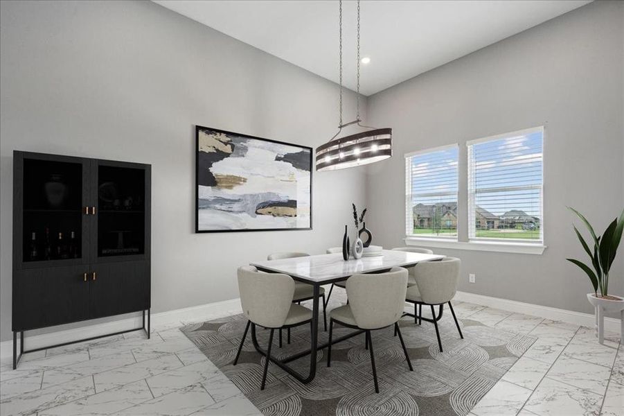 Dining space featuring a chandelier and light tile floors