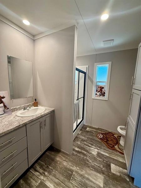 Furnished interior view inside a new home in , Pelican Bay (Image 9). Furnished interior view inside a new home in , Pelican Bay (Image 9).