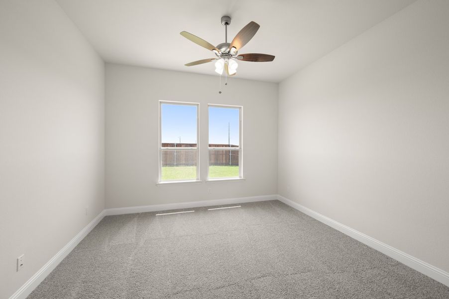 Front exterior of a new home in Still Water Lake Estates, Godley, TX, highlighting curb appeal (Image 13).