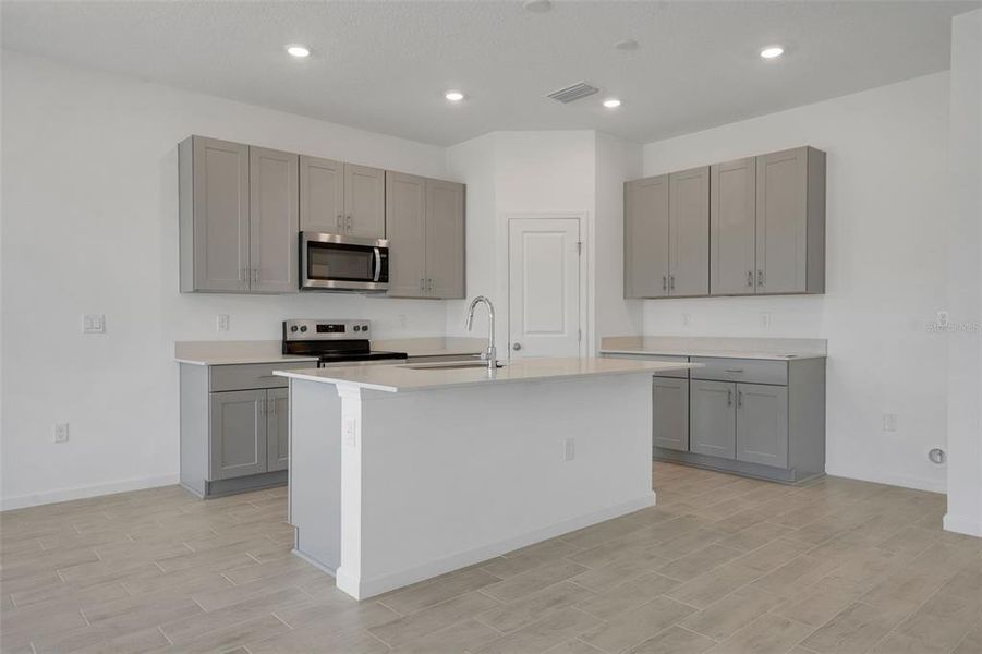 Furnished interior view inside a new home in Willowbrook North, Winter Haven (Image 6).