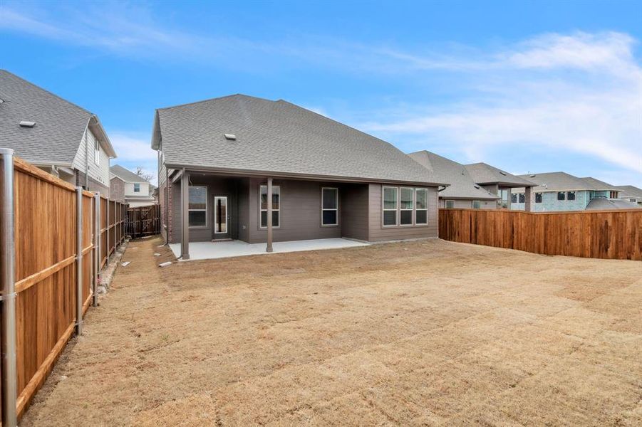 Exterior details and patio area of a home in The Landing at Hidden Lakes, McKinney (Image 25).