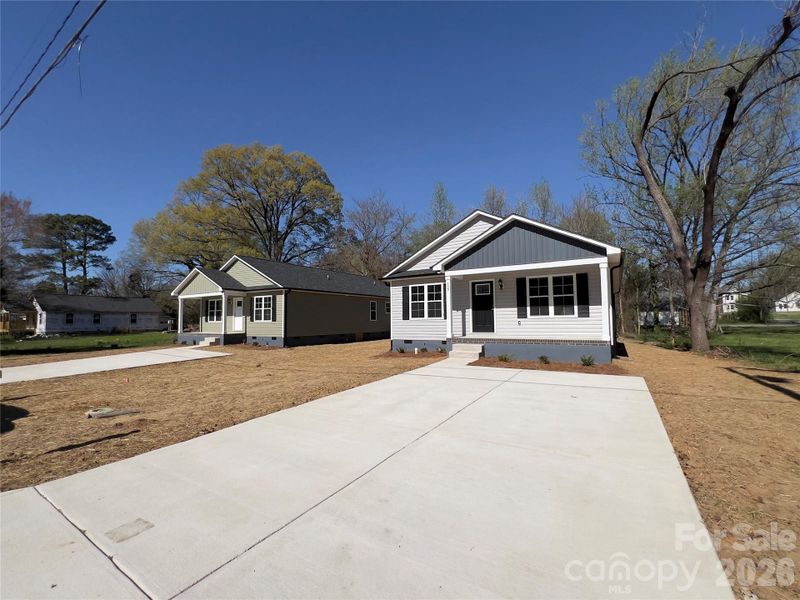 Front exterior of a new home in , Salisbury, NC, highlighting curb appeal (Image 14).