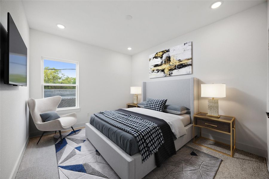 This secondary bedroom combines comfort and style, featuring plush carpeting, neutral paint, recessed lighting, a large window, and a spacious closet. This secondary bedroom combines comfort and style, featuring plush carpeting, neutral paint, recessed lighting, a large window, and a spacious closet.