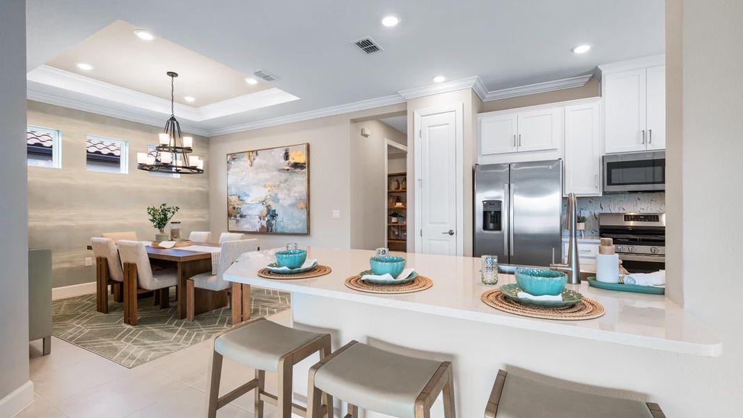 Representative furnished interior of a home built from the Roma by Taylor Morrison in Esplanade at Wiregrass Ranch, Wesley Chapel (Image 4). Representative furnished interior of a home built from the Roma by Taylor Morrison in Esplanade at Wiregrass Ranch, Wesley Chapel (Image 4).