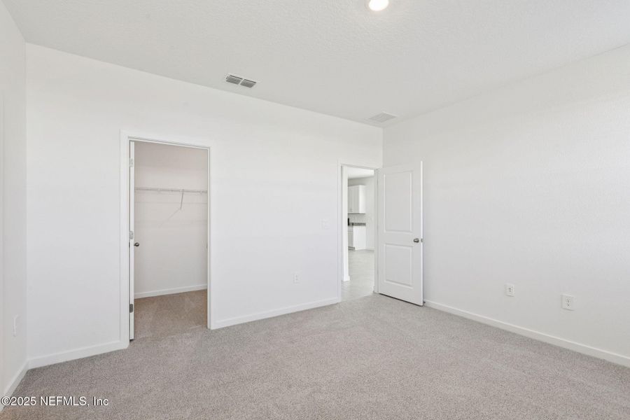 Spacious, unfurnished interior of a new home in Lakes at Bella Lago - Signature Series, Green Cove Springs (Image 29). Spacious, unfurnished interior of a new home in Lakes at Bella Lago - Signature Series, Green Cove Springs (Image 29).