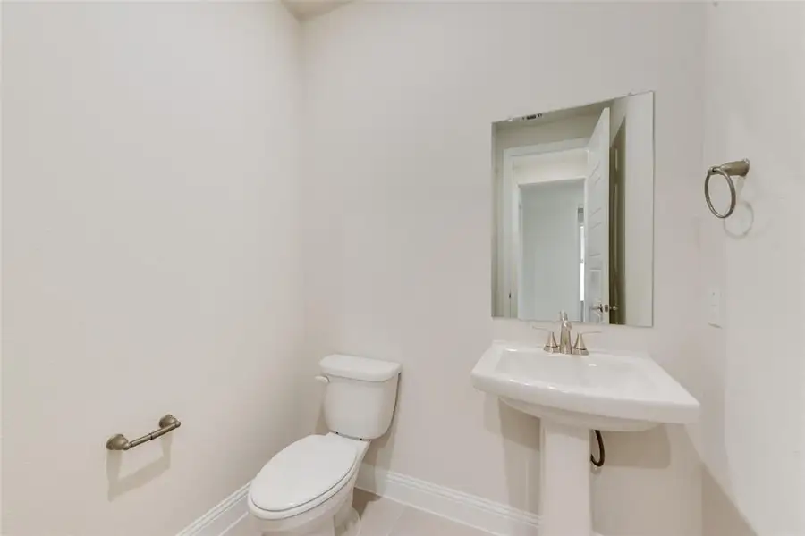 Furnished interior view inside a new home in Sutton Fields, Celina (Image 10).