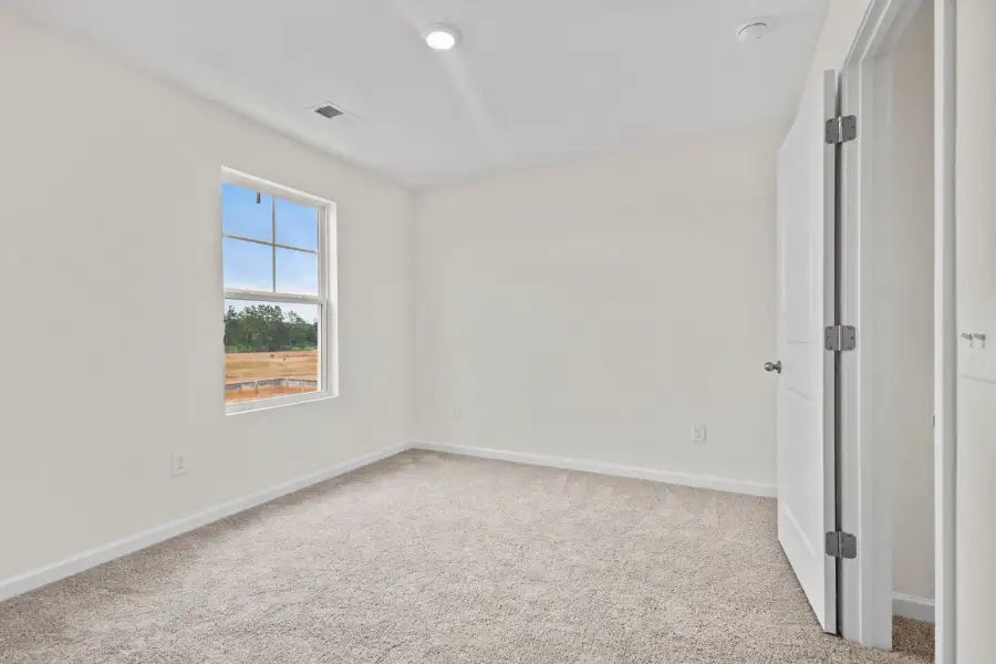 Spacious, unfurnished interior of a new home in Champions Village at Cherry Hill, Pendleton (Image 24).