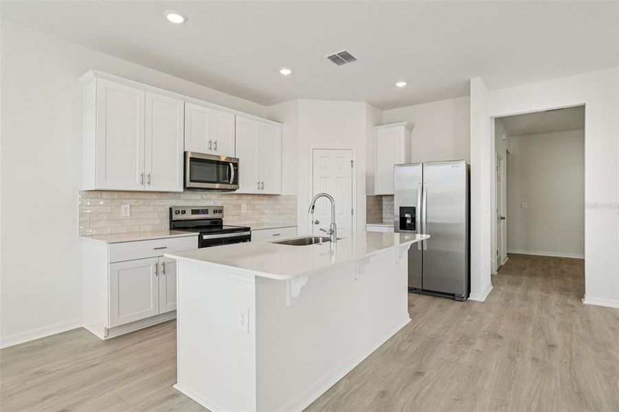 Furnished interior view inside a new home in The Meadow at Crossprairie Bungalows, St. Cloud (Image 18).