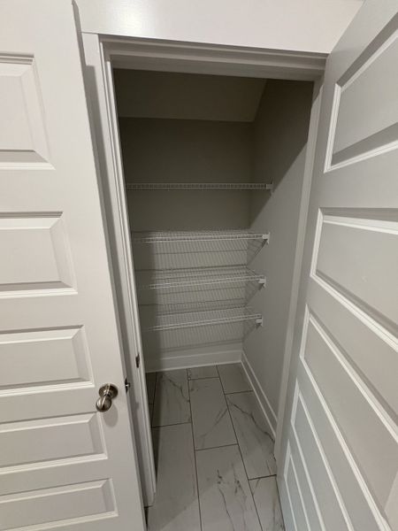 Stock image of completed house. Options and selections will vary in actual house.