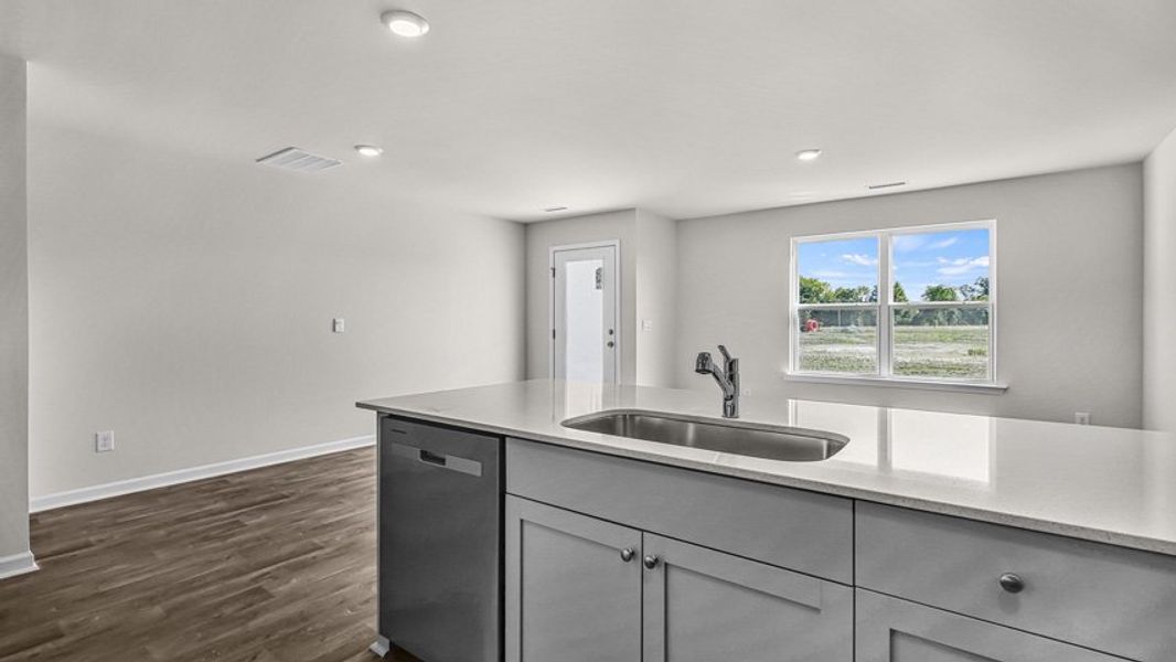 Furnished interior view inside a new home in Edinborough Townes, Gibsonville (Image 4).
