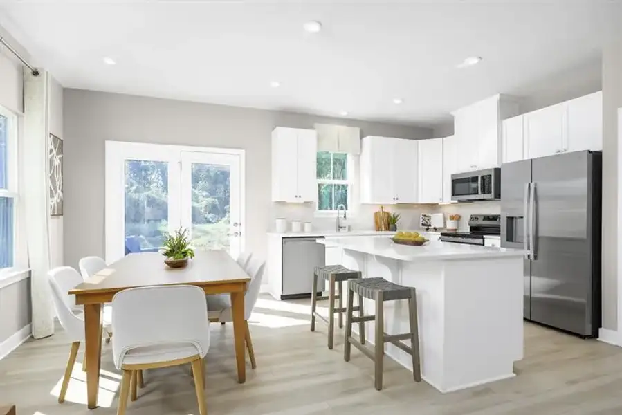 Representative furnished interior of a home built from the Odessa by Ryan Homes in Townes At Abner Creek, Greer (Image 6).
