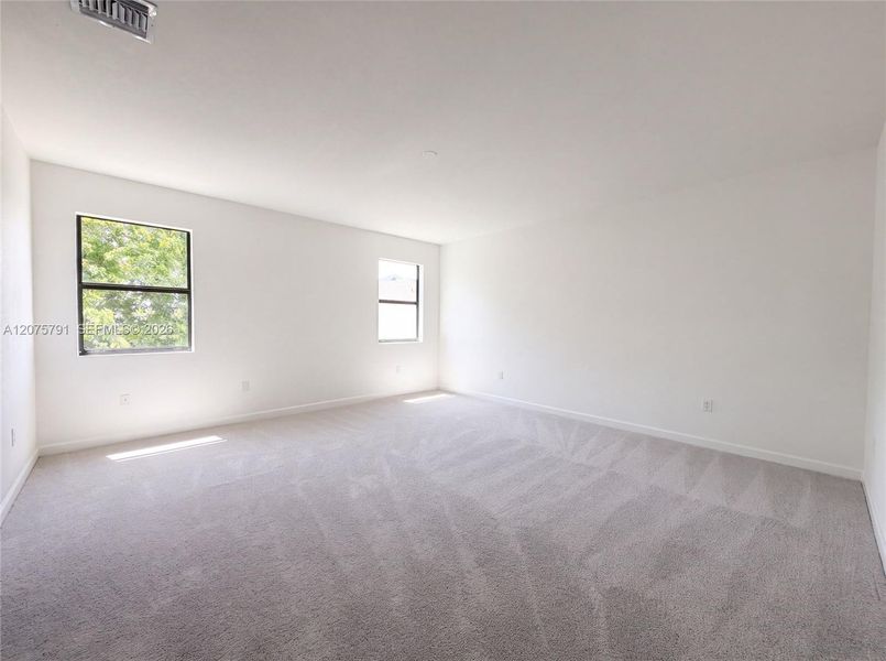 Spacious, unfurnished interior of a new home in , Goulds (Image 15).