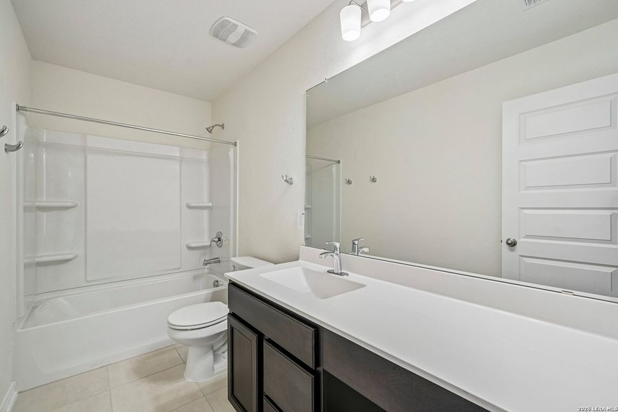Furnished interior view inside a new home in Woodside Farms, Seguin (Image 7).