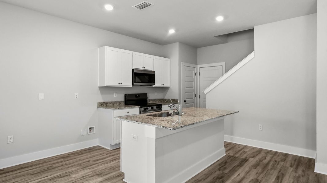 Furnished interior view inside a new home in Chateau Nemours, Port Saint Joe (Image 7).