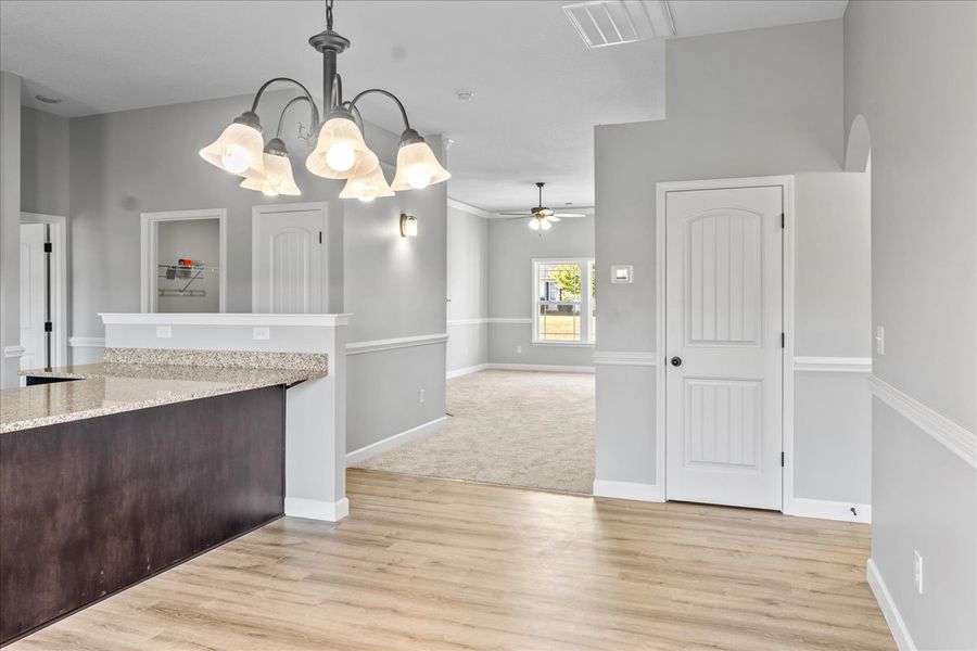 Representative furnished interior of a home built from the Whitney by Enchanted Homes in Lonesome Dove, San Antonio (Image 12).