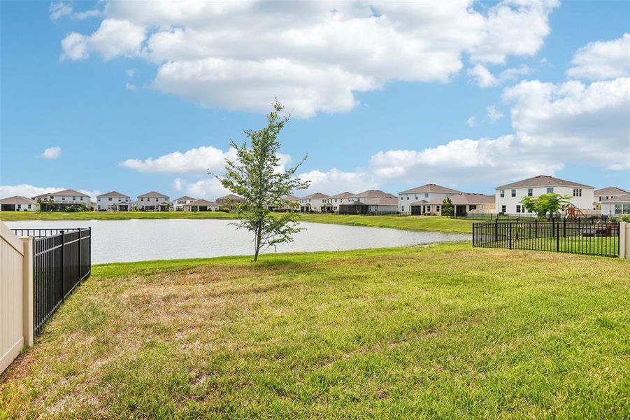 Exterior details and patio area of a home in Mangrove Manor, Apollo Beach (Image 18).
