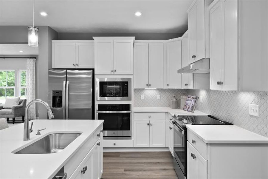 Representative furnished interior of a home built from the Roanoke by Ryan Homes in Muirwood, Murfreesboro (Image 4).