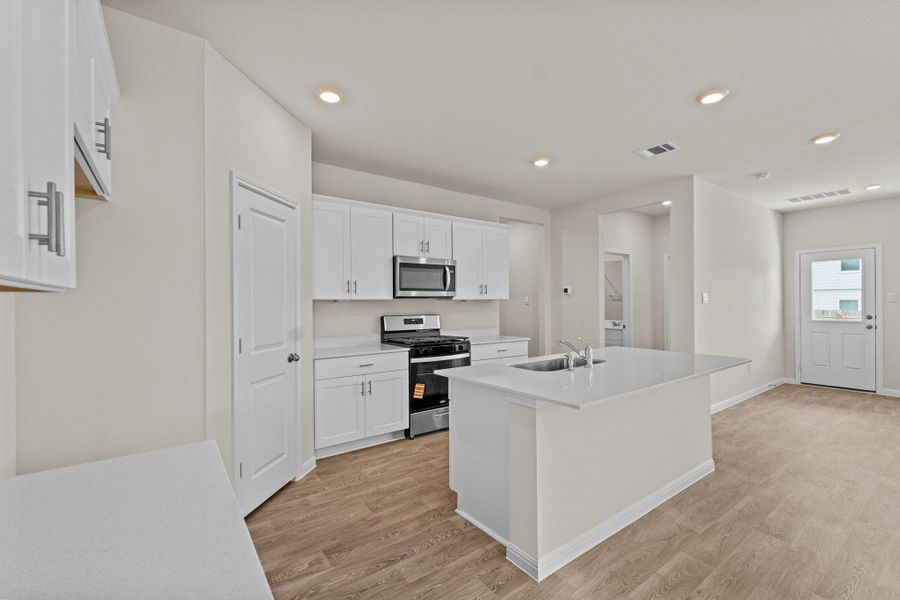 Furnished interior view inside a new home in Whisper South, San Marcos (Image 7).