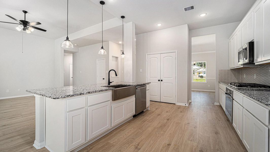 Furnished interior view inside a new home in , Bay City (Image 4). Furnished interior view inside a new home in , Bay City (Image 4).