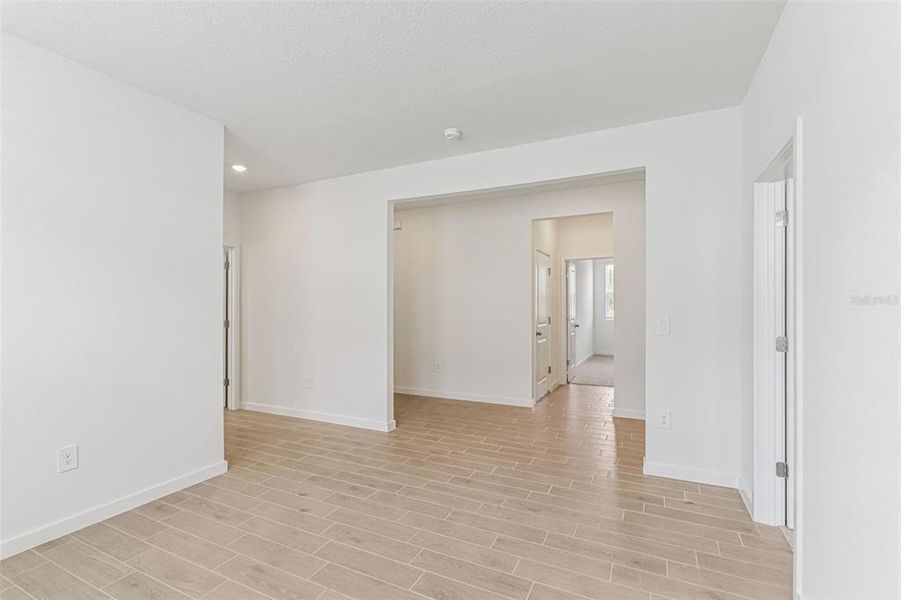 Spacious, unfurnished interior of a new home in Colbert Landings, Palm Coast (Image 23).