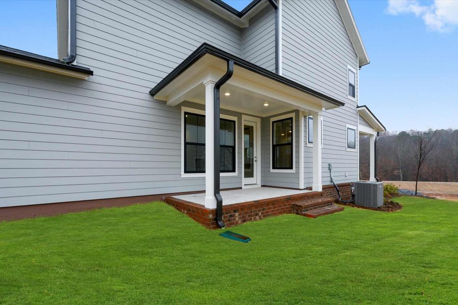 Representative exterior details of a home built from the The Rainey by David Weekley Homes in The River District - Pioneer Collection, Charlotte (Image 3).