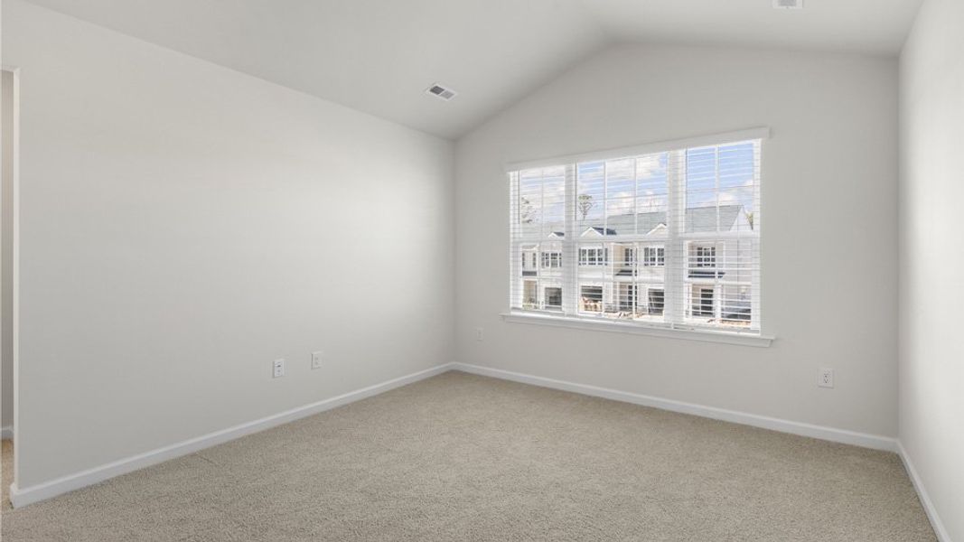 Spacious, unfurnished interior of a new home in The Townes at Galvins Ridge, Sanford (Image 24).