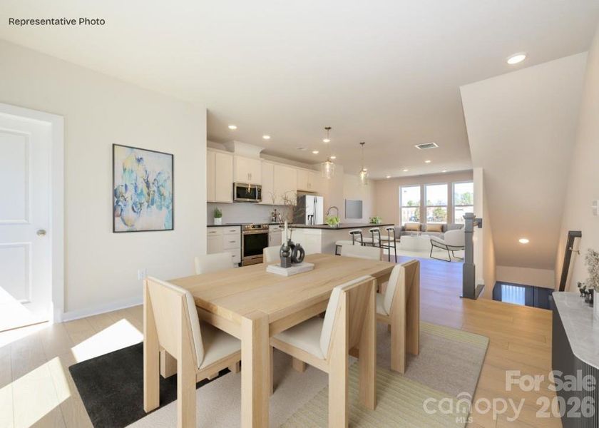 Furnished interior view inside a new home in Central Living at Craig, Charlotte (Image 4).