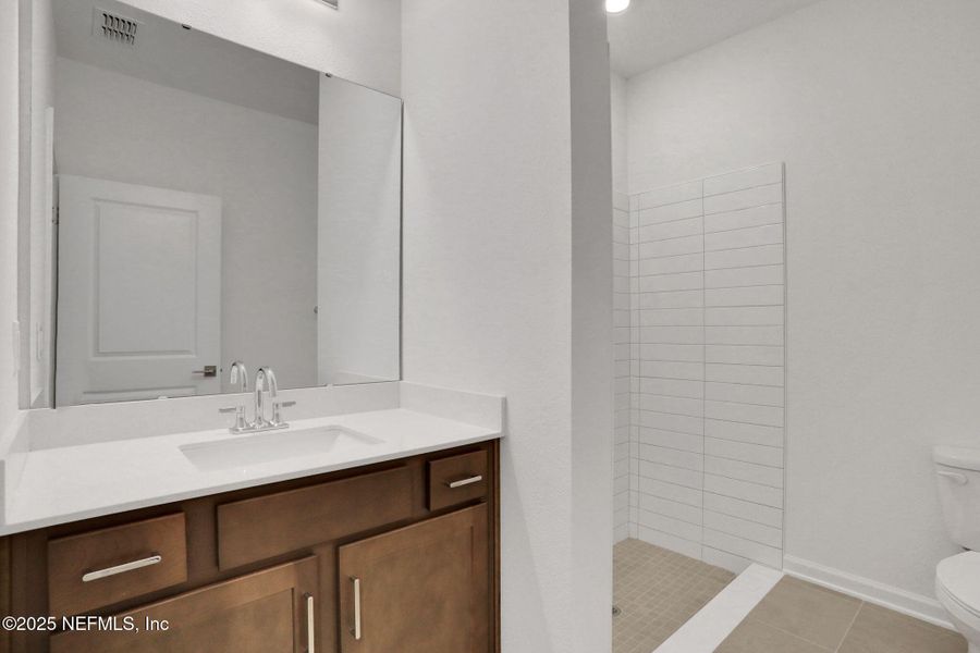 Furnished interior view inside a new home in Silver Landing at SilverLeaf, St. Augustine (Image 8). Furnished interior view inside a new home in Silver Landing at SilverLeaf, St. Augustine (Image 8).