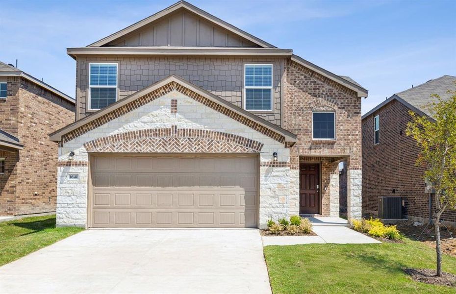 NEW CONSTRUCTION: Beautiful two-story home available at Travis Ranch in Forney