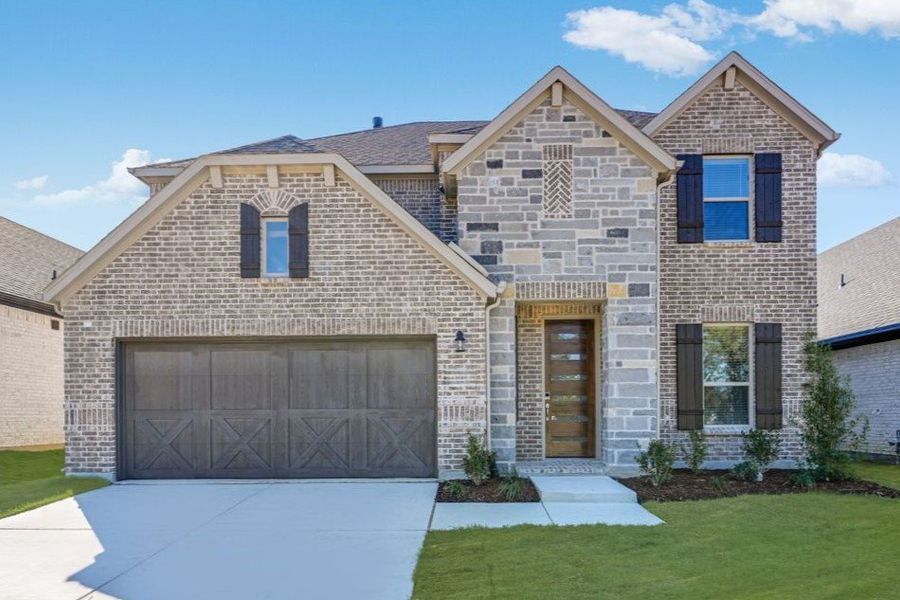 Representative exterior photo of a completed home built from the Terracotta by Taylor Morrison in South Oak 50s, Oak Point, TX (Image 2). Representative exterior photo of a completed home built from the Terracotta by Taylor Morrison in South Oak 50s, Oak Point, TX (Image 2).