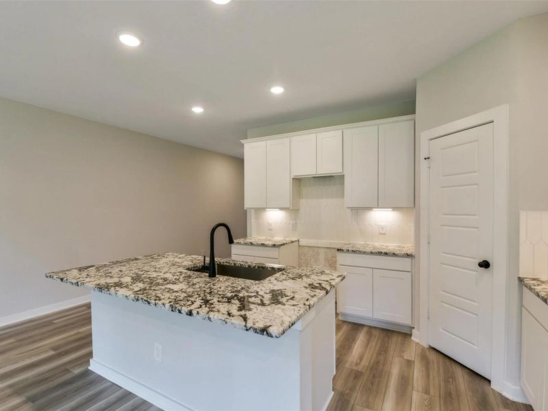 Furnished interior view inside a new home in Sundance Cove, Crosby (Image 9).