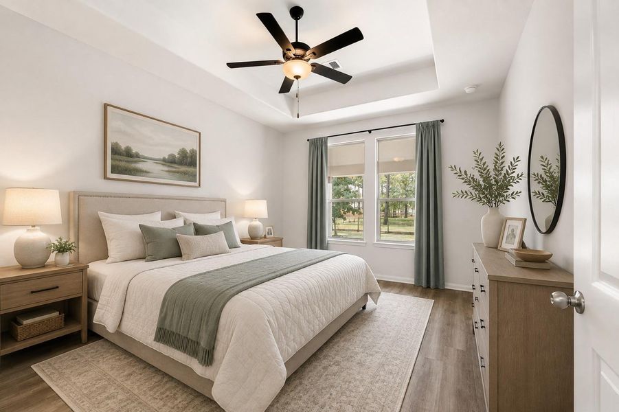 Elegant 1st floor primary bedroom with large windows offering natural light and serene views.