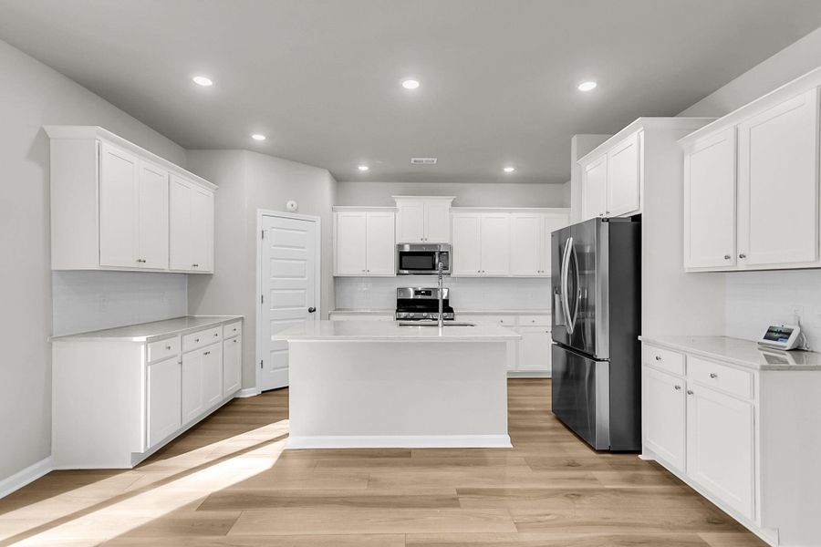 Furnished interior view inside a new home in Limehouse Village: Arbor Series, Summerville (Image 8).
