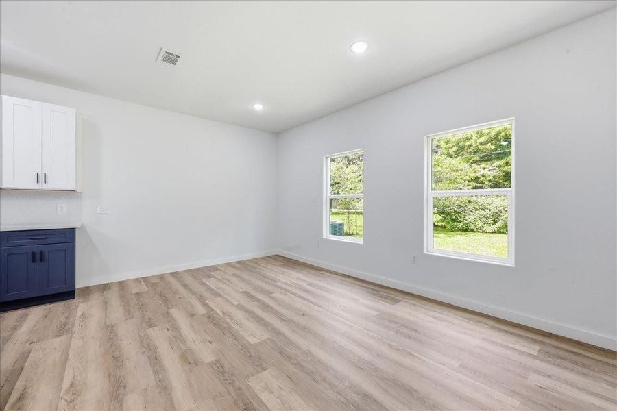 Dedicated dining area situated perfectly between the kitchen and living spaces with views of the backyard. Dedicated dining area situated perfectly between the kitchen and living spaces with views of the backyard.