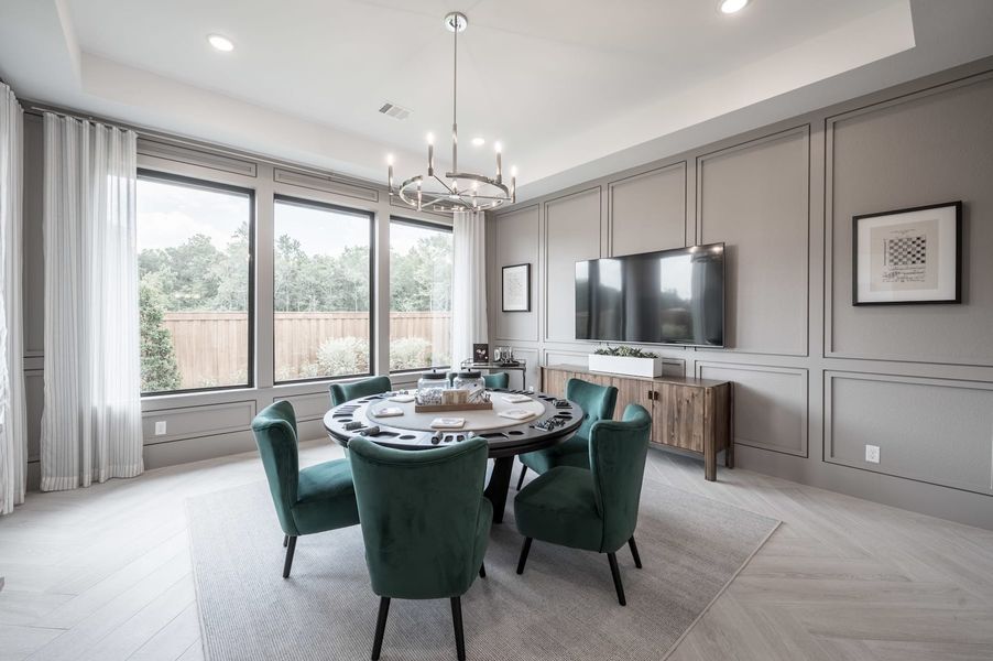 Representative furnished interior of a home built from the Carignan by Tri Pointe Homes in Woodson’s Reserve, Spring (Image 17).