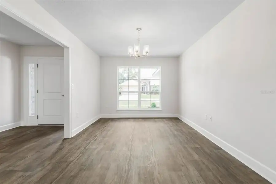 Representative unfurnished interior of a home built from the 2117 by Adams Homes in Flagler Estates, Hastings (Image 22).
