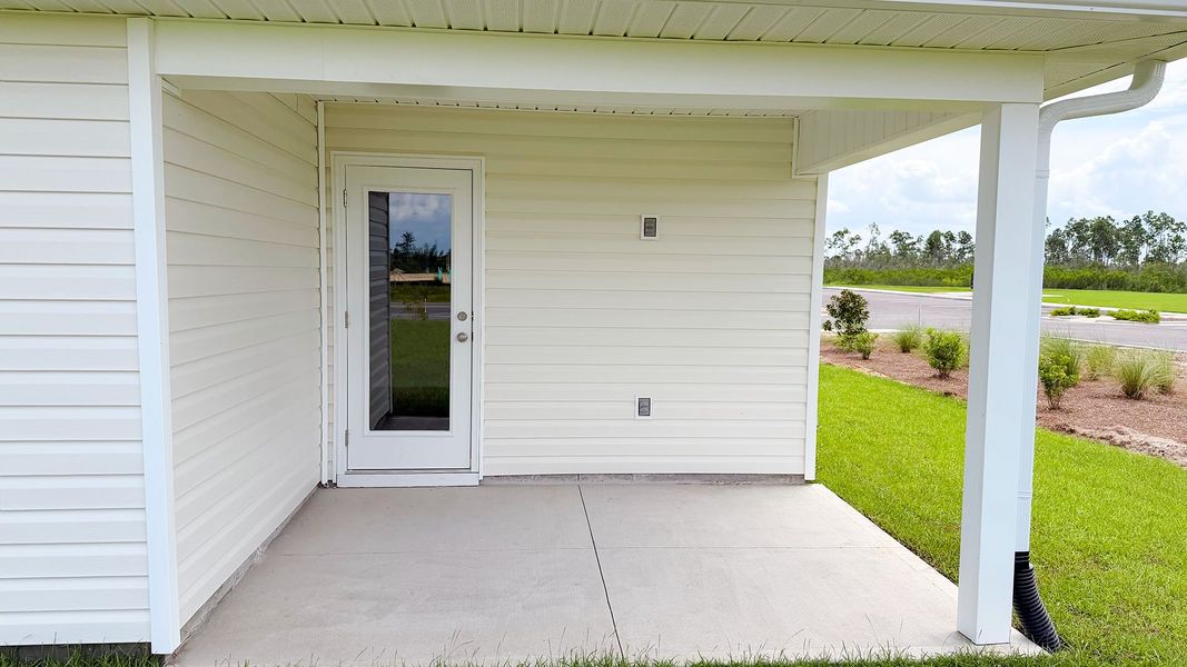 Exterior details and patio area of a home in Titus Park, Panama City (Image 4). Exterior details and patio area of a home in Titus Park, Panama City (Image 4).