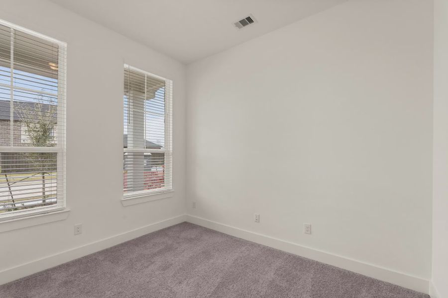 Representative unfurnished interior of a home built from the St Andrews by Chesmar Homes in Riceland Alley Loads, Mont Belvieu (Image 53).