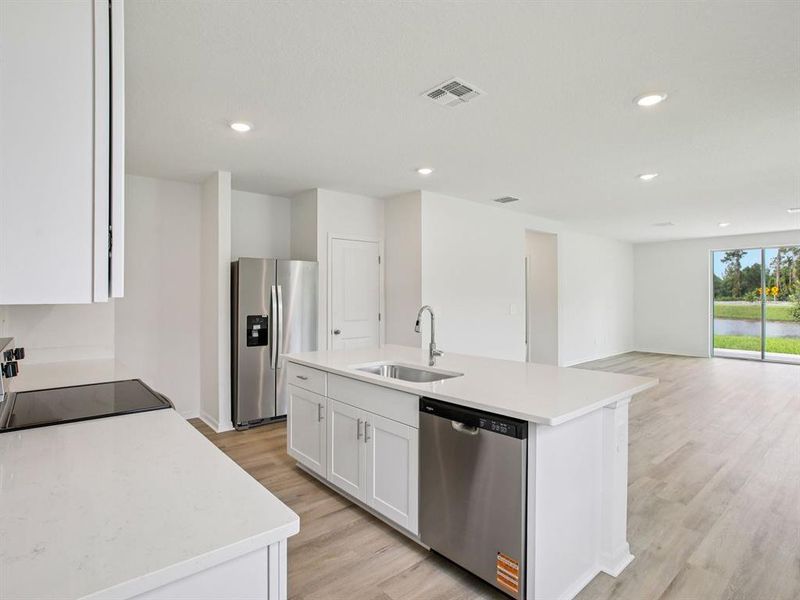 Furnished interior view inside a new home in The Grove at Stuart Crossing - Premier Series, Bartow (Image 4).