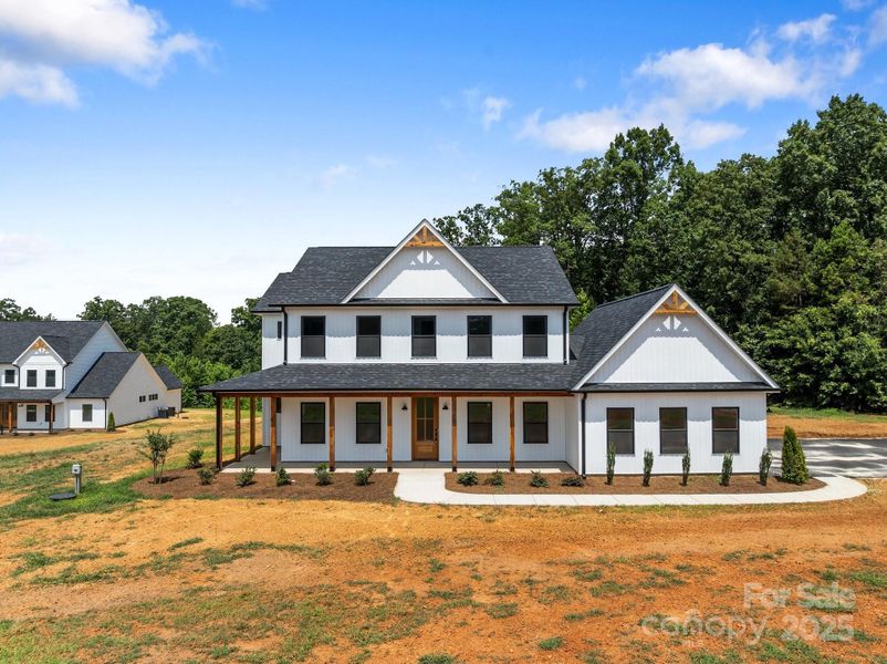 Front exterior of a new home in , China Grove, NC, highlighting curb appeal (Image 22).
